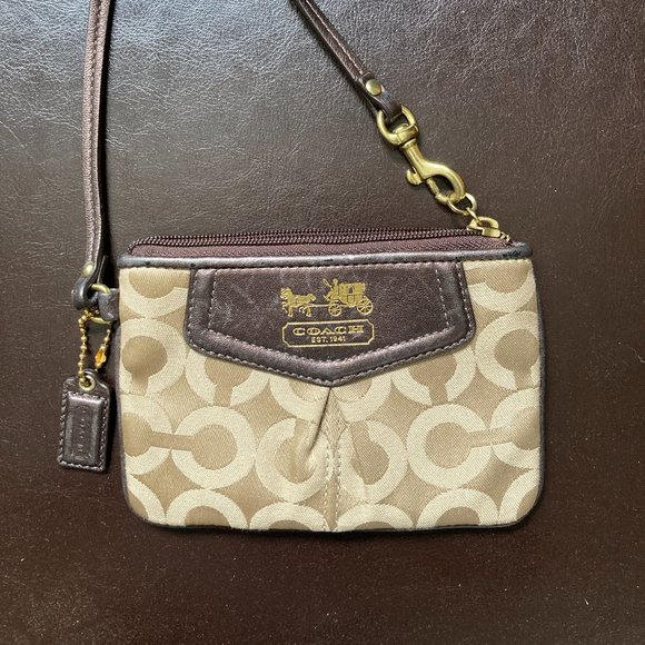 Coach Handbags - Gold Coach Wristlet